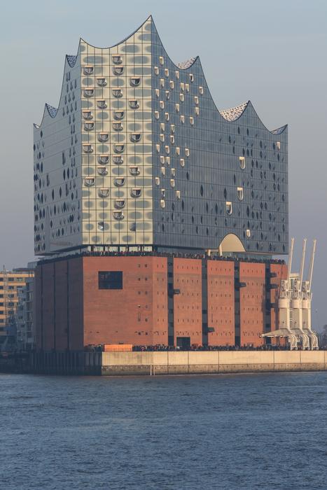 a big house is being built by the sea