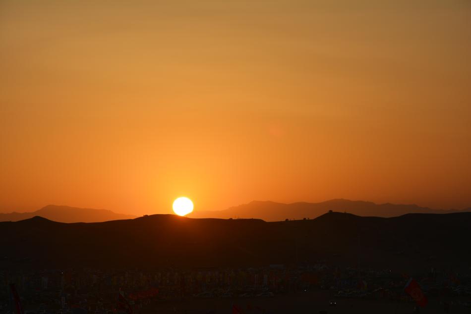sunny weather on the silhouette of the mountains