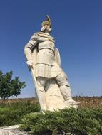 huge sculpture of a partisan in the field