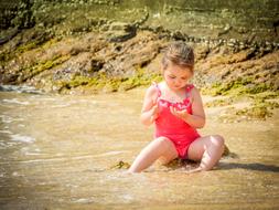 Girl Child play water
