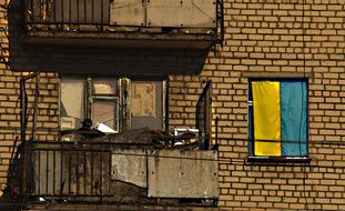 Balcony and ukrainian flag on Window