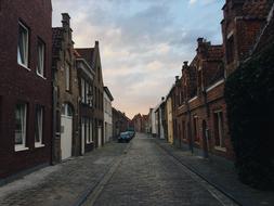 street with brick houses at sunset