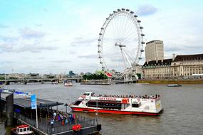 London Eye and water and boat