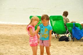 two little girls on the beach