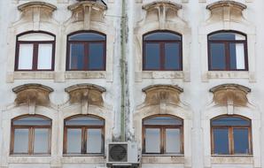 facade of a house with windows in Coimbra