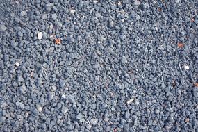 Texture of the ground with lava stone pebbles