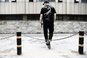 man jumping in the street