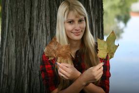 cute girl with leaves