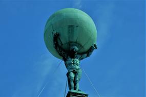 sculpture with a globe in the netherlands