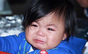 crying asian baby photo