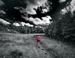 man walking on the trail