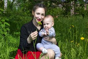 a cute girl with a weed baby