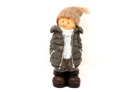 figurine of a boy in a winter jacket and hat