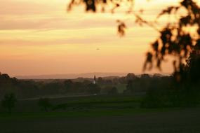 twilight landscape with a village