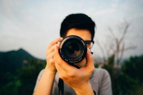 male photographer, Camera Lens close up