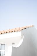 white building with red roof