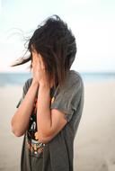 photo of Girl Female hiding face