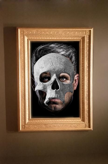 portrait of a man in a mask in a wooden frame