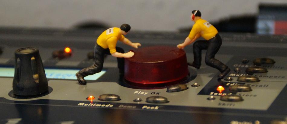plastic figures on the DJ panel
