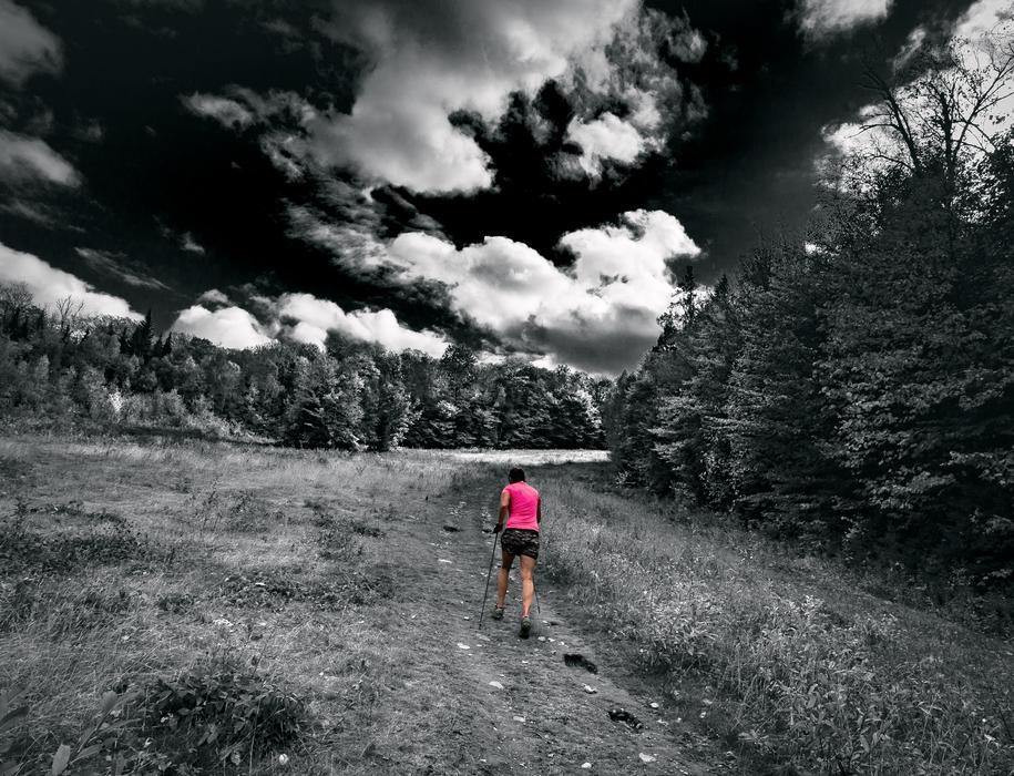 man walking on the trail