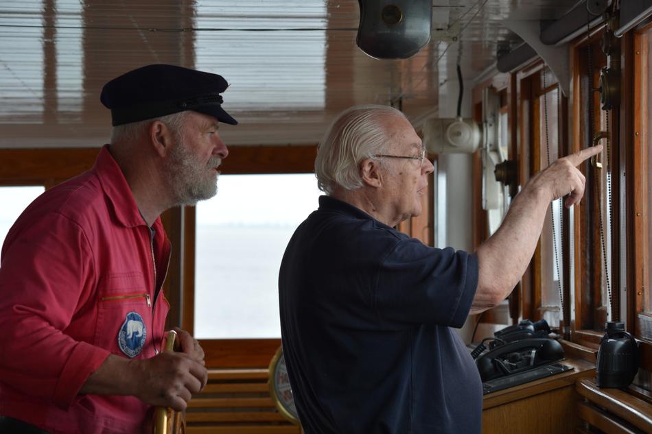 captain of the steamboat shows the way