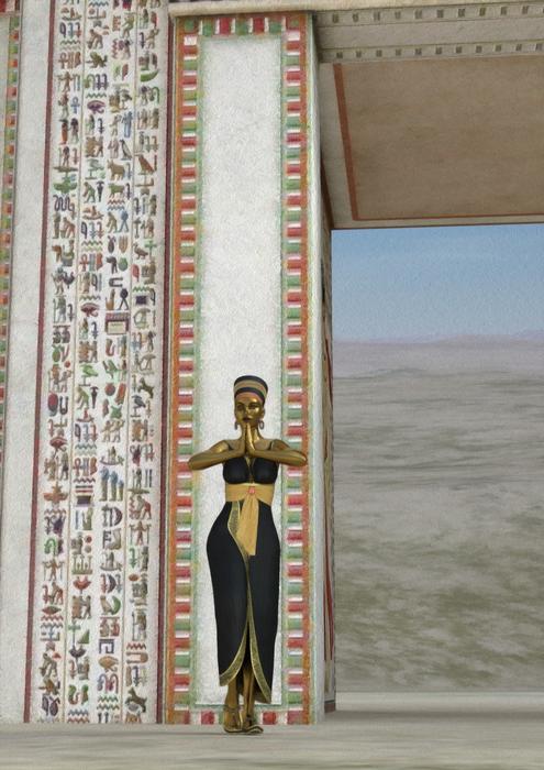 woman standing outside an Egyptian building