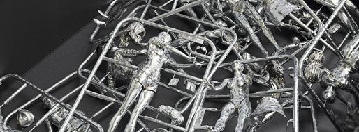 Metal model of a female character