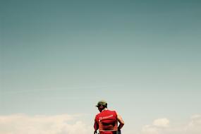 Guy in red sky