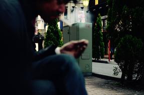 photo of a man smoking