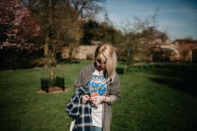 girl in the shade of the garden