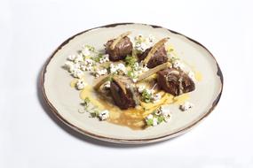 meat on plate in sauce