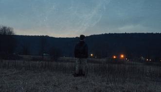 landscape of Kid Boy on meadow and mountain