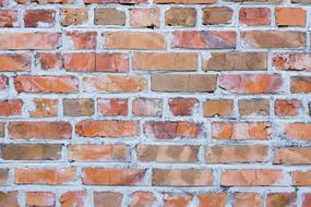 Close-up of the colorful brick wall texture with bricks