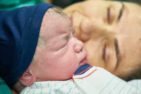 mom with newborn close up