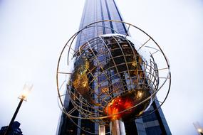 Architecture Building and globe sculpture