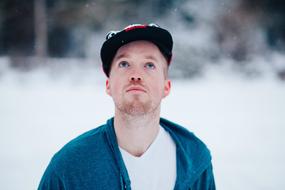 portrait of man in cap at winter