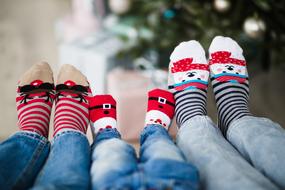 family in funny socks for christmas