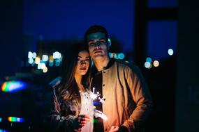 young asian couple at Night city Lights