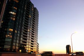 apartment Building near road at dusk