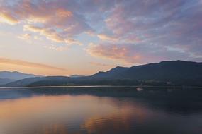 tranquil lake by the mountains