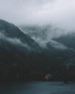 mountainous terrain in the clouds