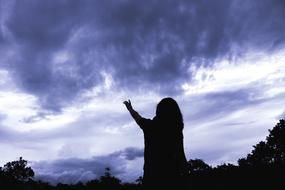 Dark Girl silhouette blue sky