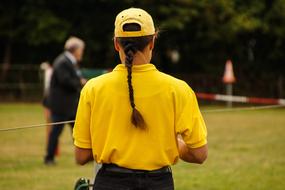 girl in yellow sports suit