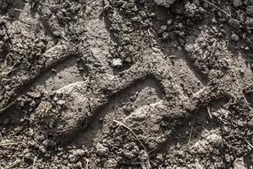 Closeup picture of dirt Texture wheel tire print