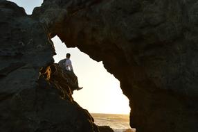 Guy Man on rocky cave