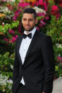 Portrait of handsome man in Wedding suit with bow tie