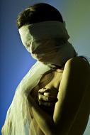 Woman Sexy Fictiongirl with a white scarf wrapped around her face