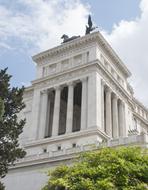 Beautiful forum and plants in Rome, Italy, under the blue sky with white clouds