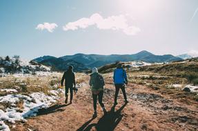 hiking in the mud in the mountains on a sunny day