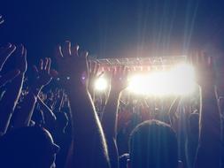 People Crowd Hands concert